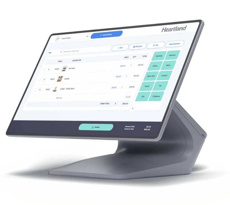 Heartland countertop touchscreen POS terminal, shown as an illustrative hardware example